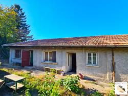 One-storey house with a garage, outbuildings and big, flat yard located in the village of Karaisen, 15 km away from the nearest town