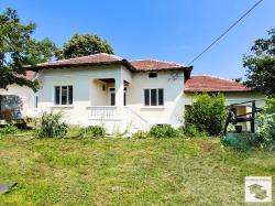 Renovated one-story house, with a garage and a spacious yard, in the village of Strahilovo, 10 minutes drive from the town of Polski Trambesh