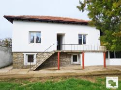 Fully renovated house, with garage and flat yard, in the village of Duskot
