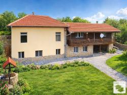 Renovated two-story stone house with a spacious yard, well and barn in the village of Gorna Lipnitsa