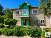 Two-story house with a flat, well-maintained yard with a well in the village of Ovcha Mogila