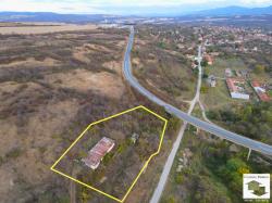 A large plot of land with a warehouse for sale in Kilifarevo