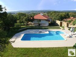 Two-story house in a traditional style, with a pool in the village of Manoya, 20 min. drive from Veliko Tarnovo
