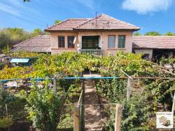 Two-storey house with a big yard in a well-developed village Kutsina not far from the town of Veliko Tarnovo