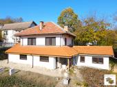 Two-story house with a well and a panoramic view in the village of Kostenkovtsi